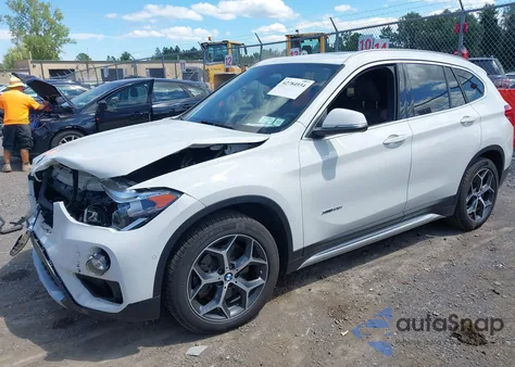 2018 BMW X1 xDrive28I z USA, uszkodzony, nr VIN WBXHT3C35J5K27953